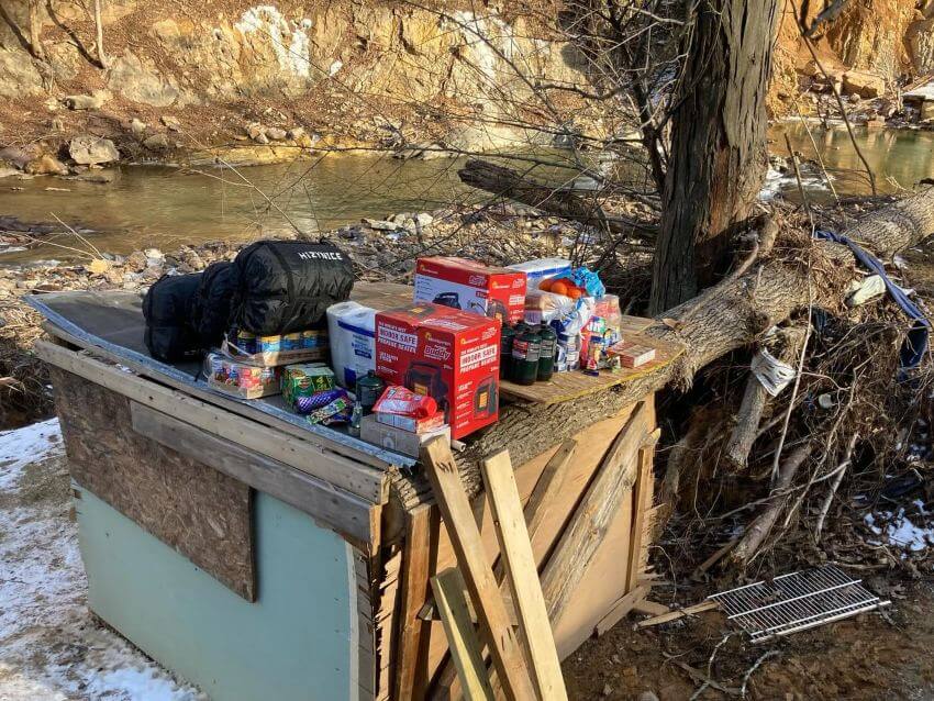 makeshift wood table with disaster supplies