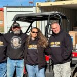 five volunteers loading truck