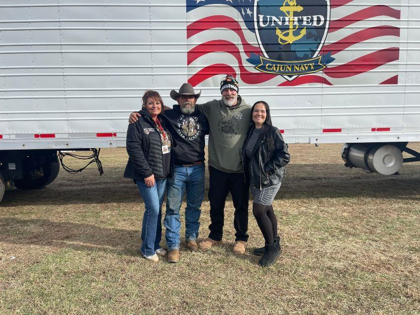 United Cajun Navy and Mountain Mule Packers United Cajun Navy and the Toberers in front of American flag