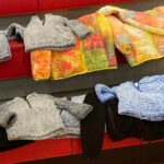 Rows of colorful winter coats for children